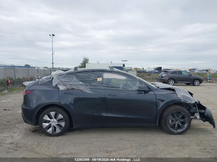 2024 Tesla Model Y Long Range VIN: 7SAYGDEE9RF989878 Lot: 12382389