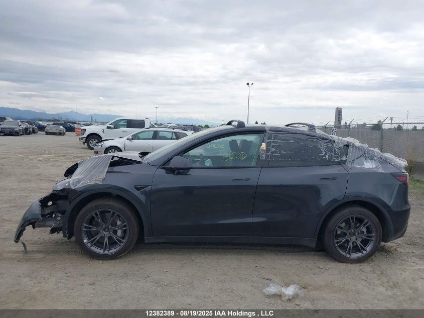 2024 Tesla Model Y Long Range VIN: 7SAYGDEE9RF989878 Lot: 12382389