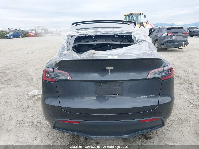 2024 Tesla Model Y Long Range VIN: 7SAYGDEE9RF989878 Lot: 12382389