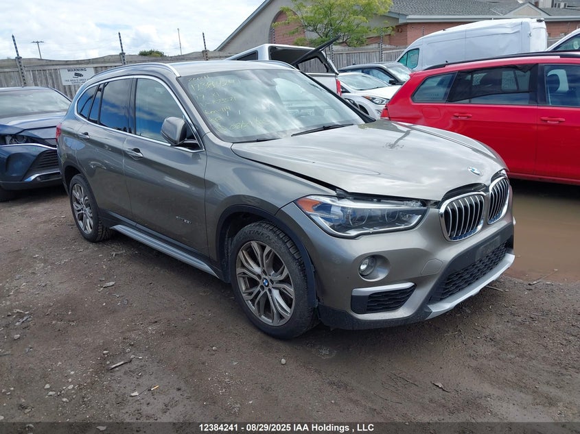 WBXHT3C34H5F73571 2017 BMW X1 xDrive28I auction photo 1