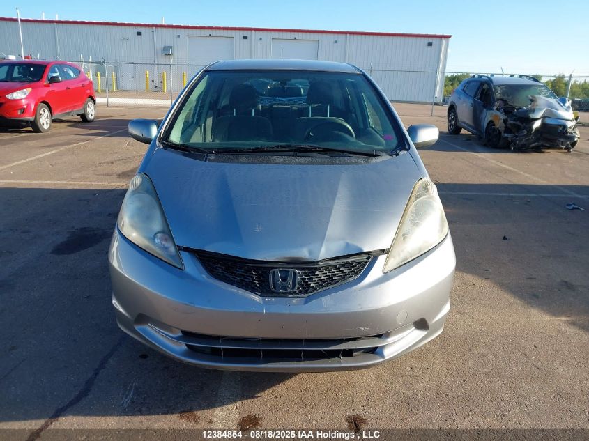 2010 Honda Fit Lx VIN: JHMGE8G52AC800720 Lot: 12384854