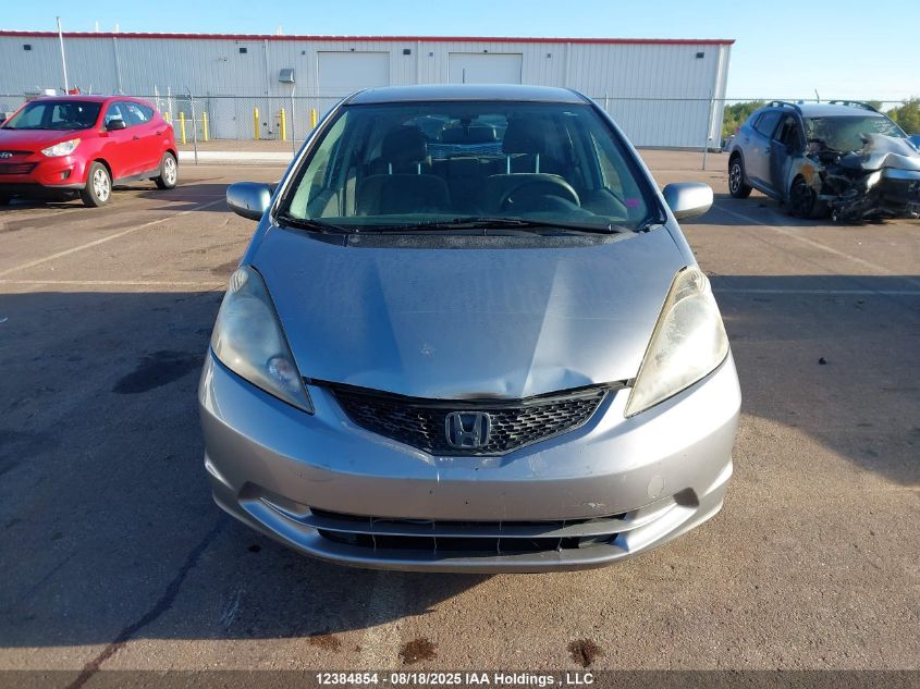2010 Honda Fit Lx VIN: JHMGE8G52AC800720 Lot: 12384854