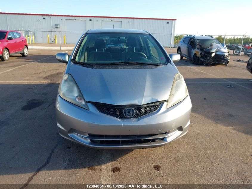 2010 Honda Fit Lx VIN: JHMGE8G52AC800720 Lot: 12384854
