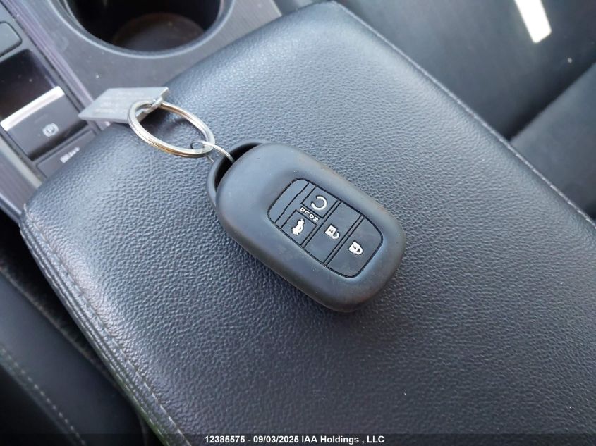 2023 Honda Civic Touring VIN: 2HGFE1F98PH000259 Lot: 12385575