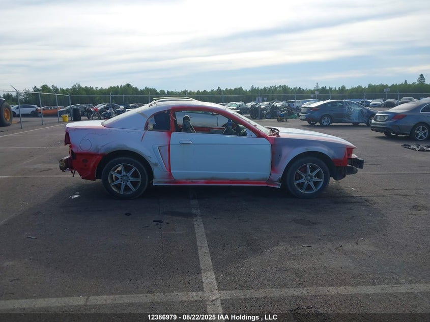 2000 Ford Mustang VIN: 1FAFP4049YF263568 Lot: 12386979