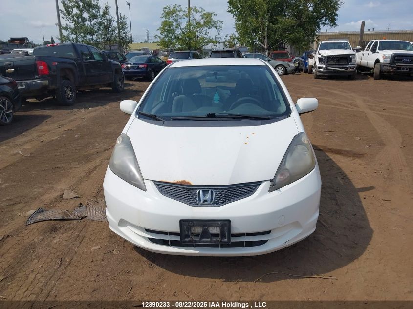 2009 Honda Fit Lx VIN: JHMGE88539S805778 Lot: 12390233