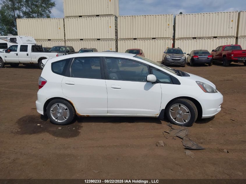 2009 Honda Fit Lx VIN: JHMGE88539S805778 Lot: 12390233