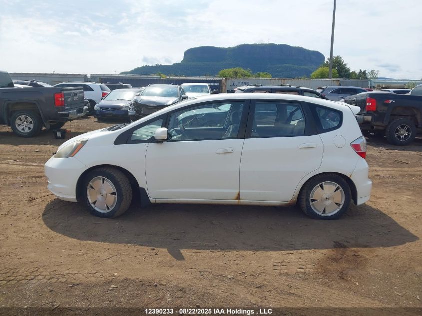 2009 Honda Fit Lx VIN: JHMGE88539S805778 Lot: 12390233