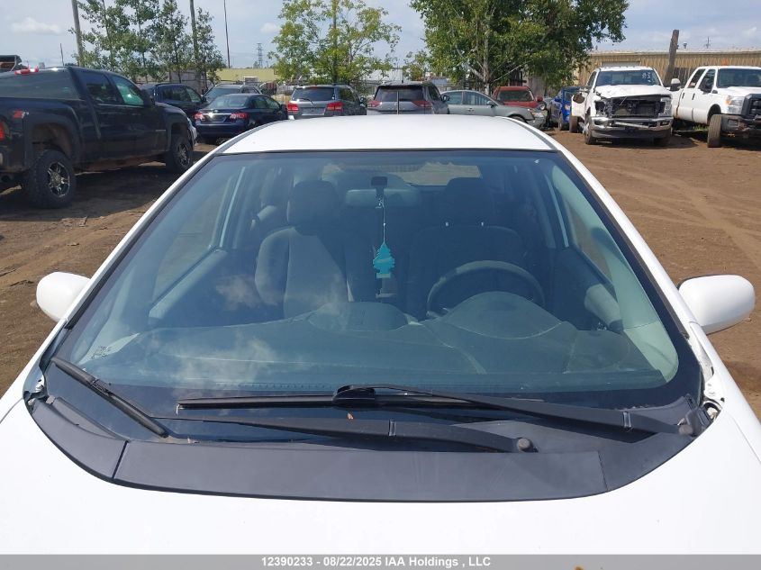 2009 Honda Fit Lx VIN: JHMGE88539S805778 Lot: 12390233