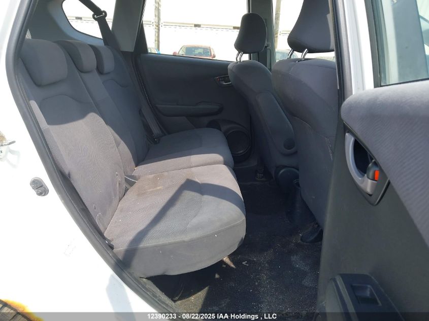 2009 Honda Fit Lx VIN: JHMGE88539S805778 Lot: 12390233