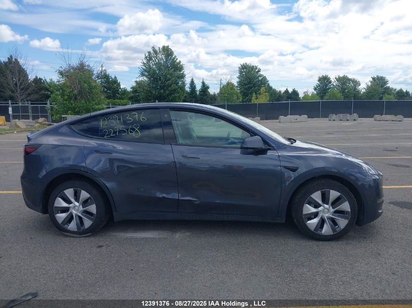 2023 Tesla Model Y VIN: LRWYGDFD6PC227568 Lot: 12391376