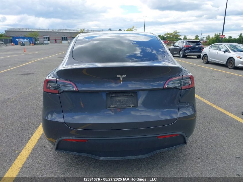 2023 Tesla Model Y VIN: LRWYGDFD6PC227568 Lot: 12391376