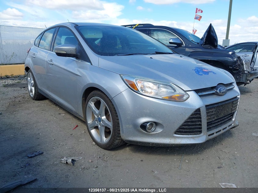 1FAHP3N29CL388848 2012 Ford Focus Titanium auction photo 1