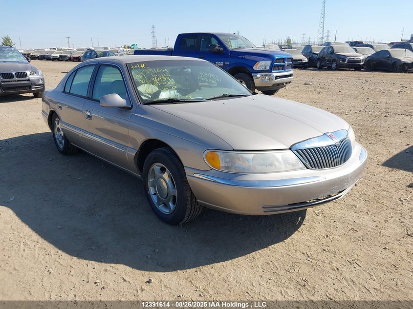 1LNHM97V5XY696939 1999 Lincoln Continental auction photo 1