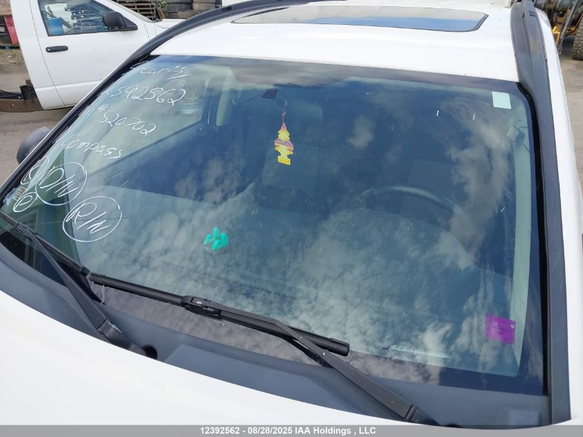 2010 Jeep Compass Sport/North VIN: 1J4NF4FBXAD520702 Lot: 12392562