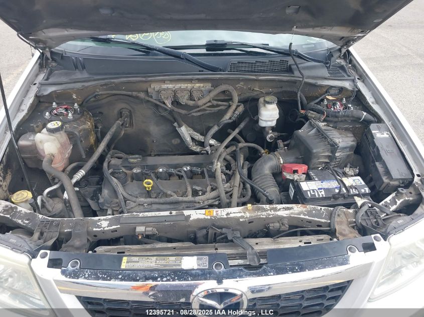 2011 Mazda Tribute I VIN: 4F2CY0C77BKM04242 Lot: 12395721