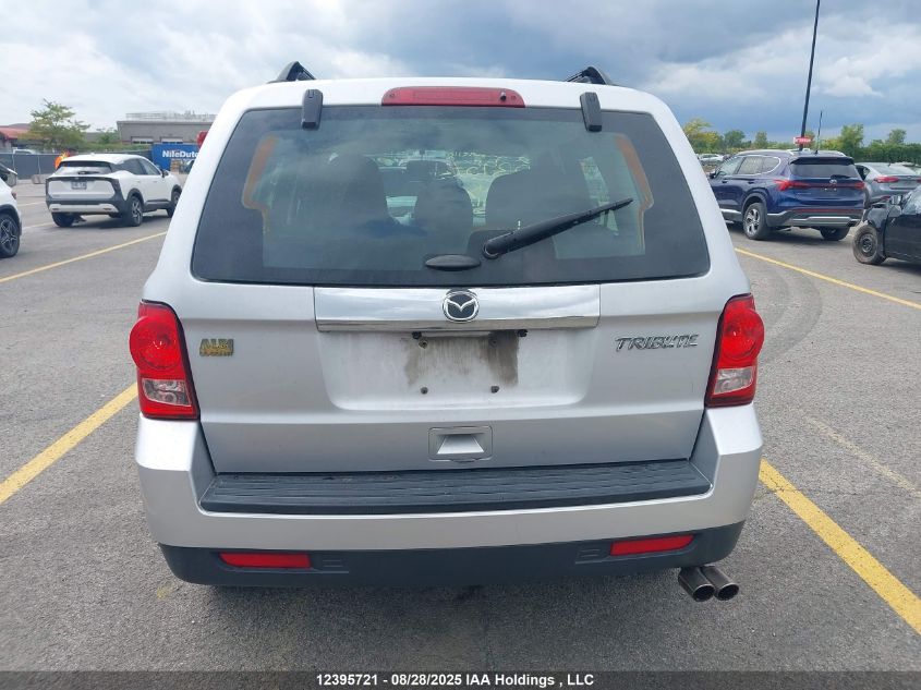 2011 Mazda Tribute I VIN: 4F2CY0C77BKM04242 Lot: 12395721