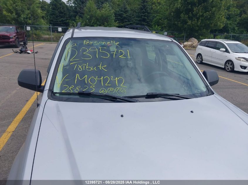 2011 Mazda Tribute I VIN: 4F2CY0C77BKM04242 Lot: 12395721