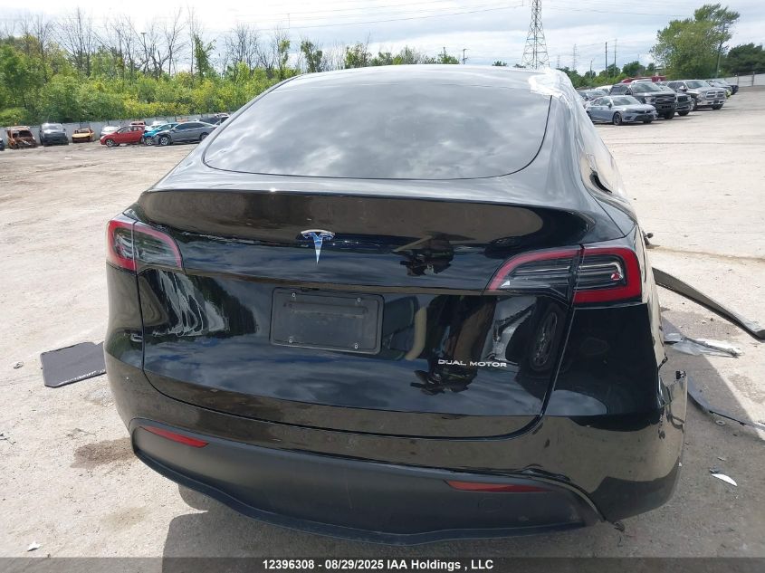 2025 Tesla Model Y VIN: 7SAYGDEE0SF317942 Lot: 12396308