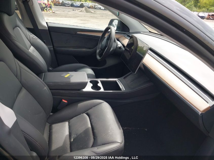 2025 Tesla Model Y VIN: 7SAYGDEE0SF317942 Lot: 12396308