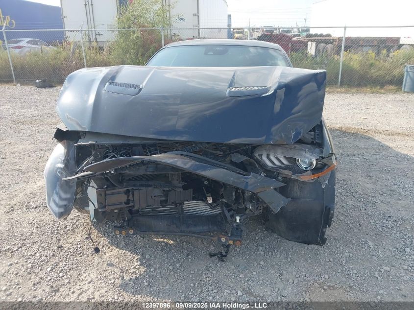 2021 Ford Mustang Ecoboost Premium VIN: 1FA6P8TH4M5128584 Lot: 12397896