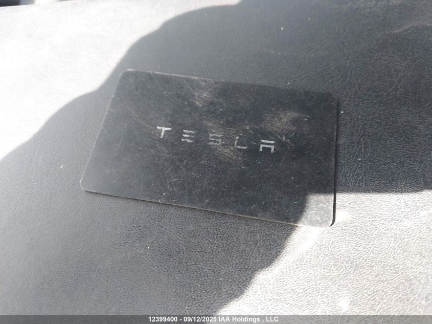 2022 Tesla Model Y Long Range VIN: 7SAYGDEE4NF518439 Lot: 12399400