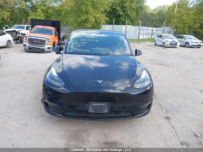2022 Tesla Model Y Long Range VIN: 7SAYGDEE4NF518439 Lot: 12399400