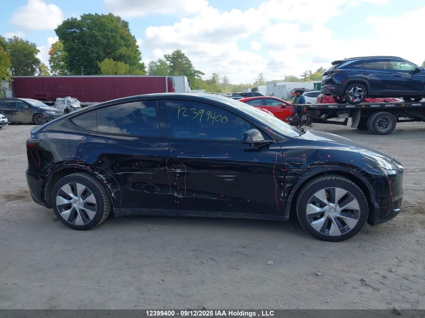 2022 Tesla Model Y Long Range VIN: 7SAYGDEE4NF518439 Lot: 12399400