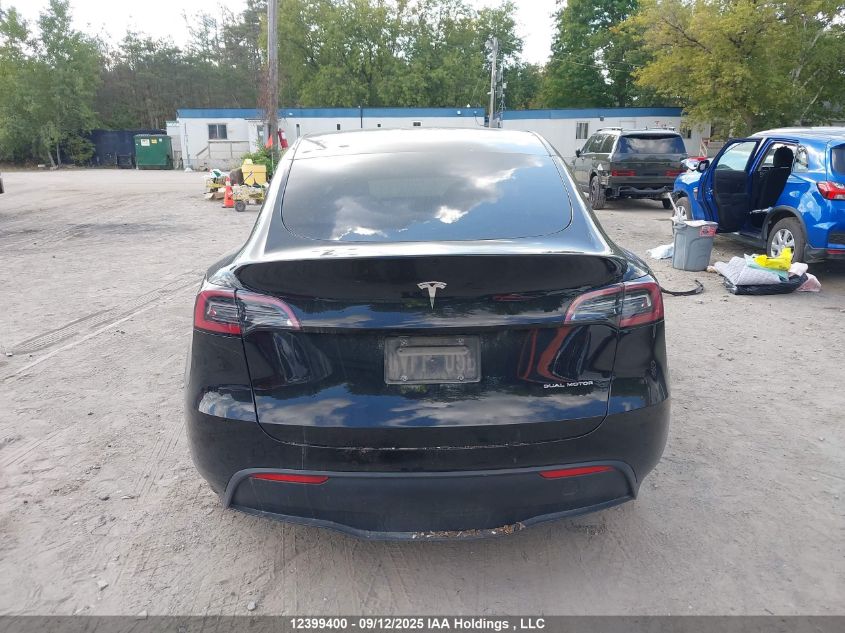 2022 Tesla Model Y Long Range VIN: 7SAYGDEE4NF518439 Lot: 12399400