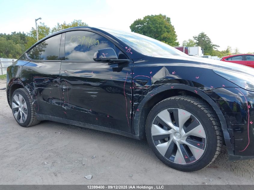 2022 Tesla Model Y Long Range VIN: 7SAYGDEE4NF518439 Lot: 12399400