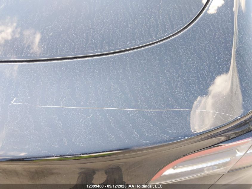 2022 Tesla Model Y Long Range VIN: 7SAYGDEE4NF518439 Lot: 12399400