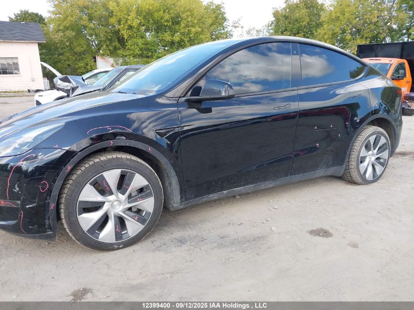 2022 Tesla Model Y Long Range VIN: 7SAYGDEE4NF518439 Lot: 12399400