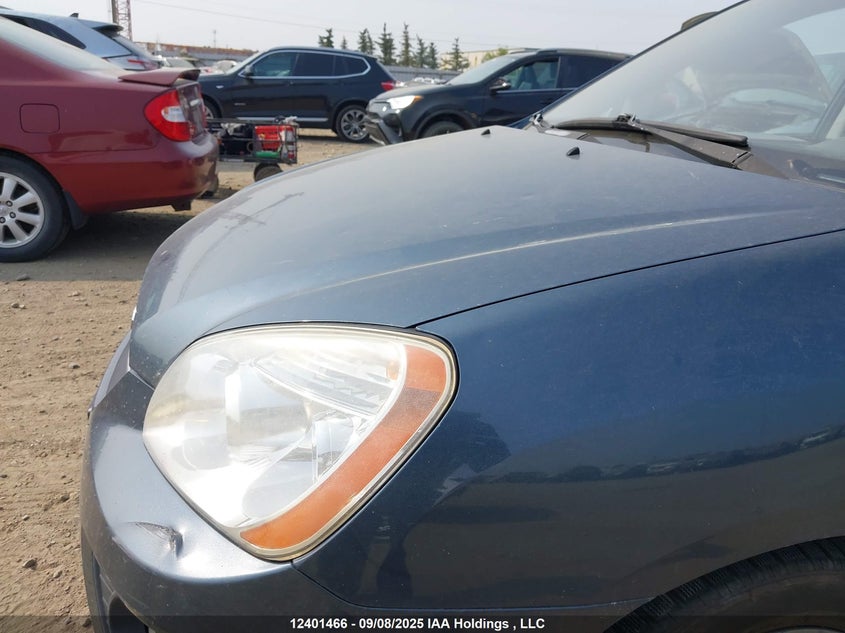KNAFG528597231080 2009 KIA RONDO photo no. 12