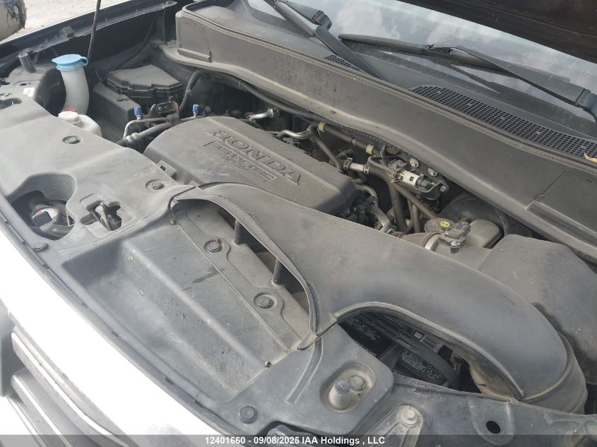 2014 Honda Pilot Touring VIN: 5FNYF4H91EB504741 Lot: 12401660