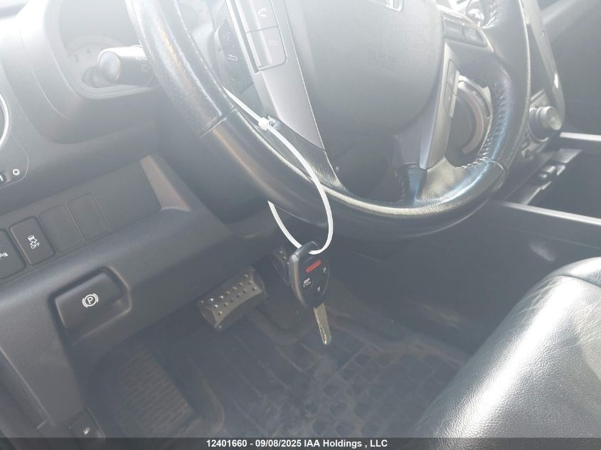 2014 Honda Pilot Touring VIN: 5FNYF4H91EB504741 Lot: 12401660