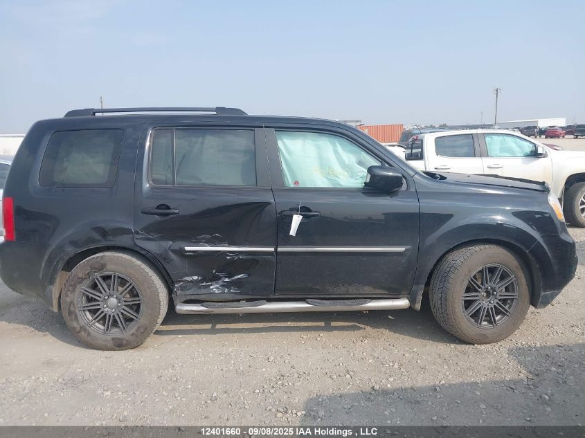 2014 Honda Pilot Touring VIN: 5FNYF4H91EB504741 Lot: 12401660