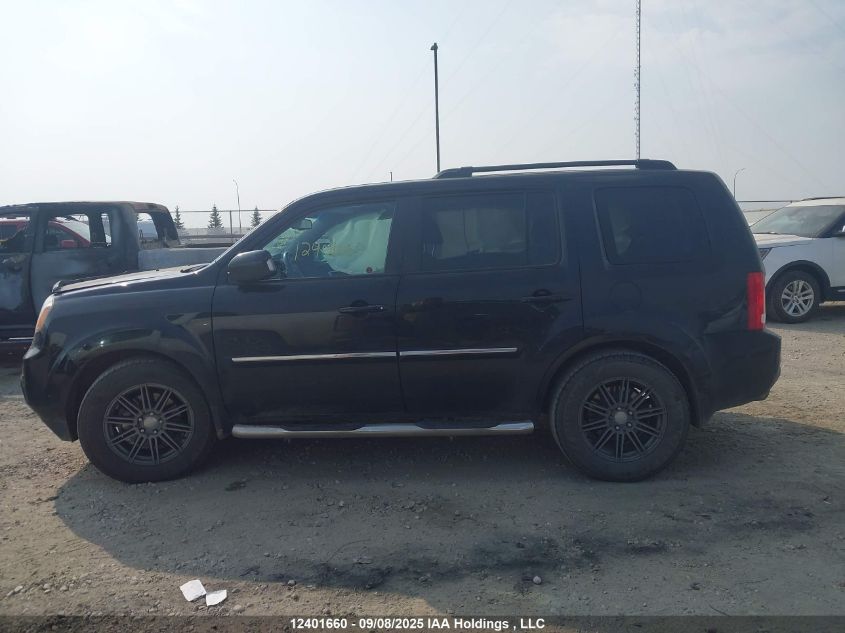 2014 Honda Pilot Touring VIN: 5FNYF4H91EB504741 Lot: 12401660