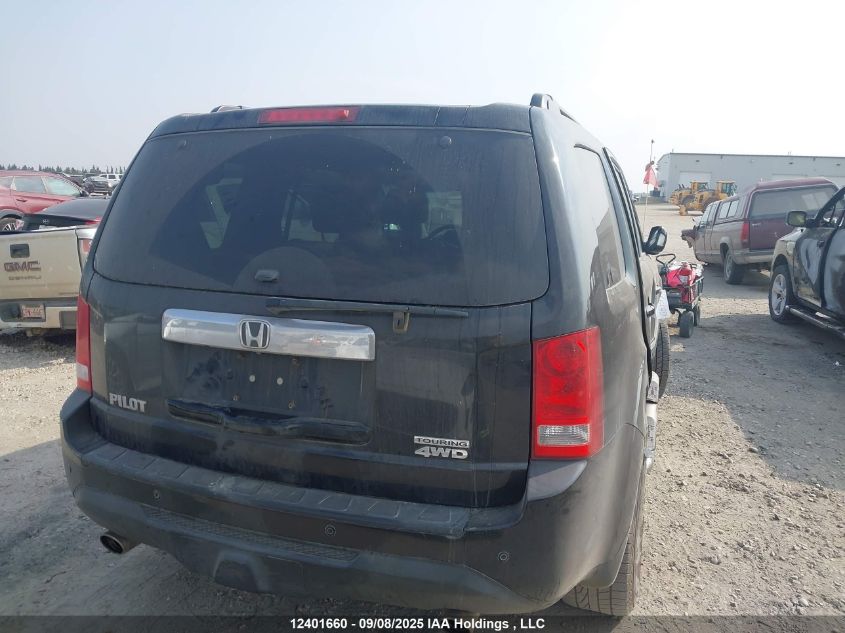 2014 Honda Pilot Touring VIN: 5FNYF4H91EB504741 Lot: 12401660