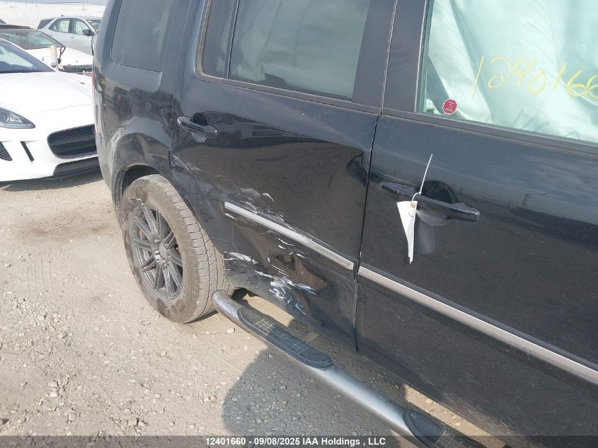 2014 Honda Pilot Touring VIN: 5FNYF4H91EB504741 Lot: 12401660