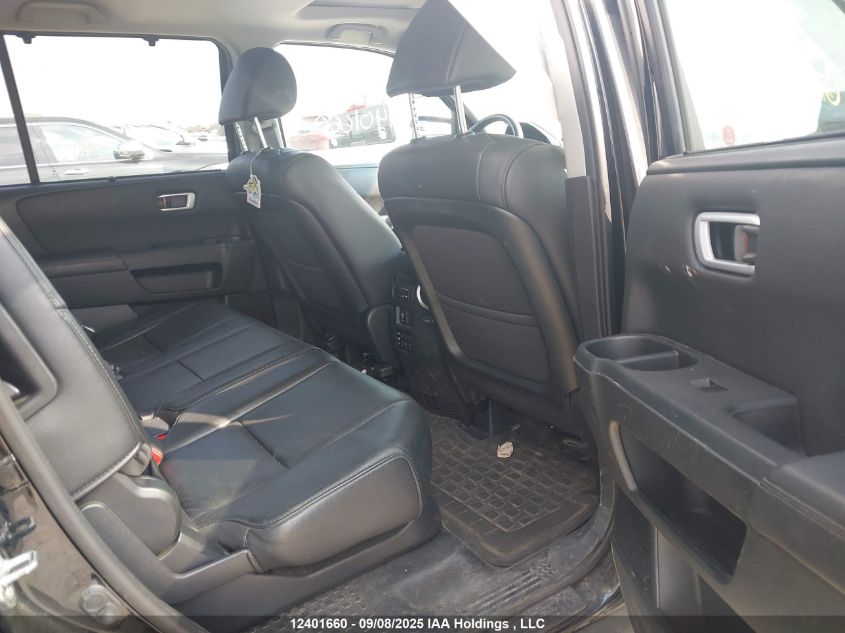 2014 Honda Pilot Touring VIN: 5FNYF4H91EB504741 Lot: 12401660