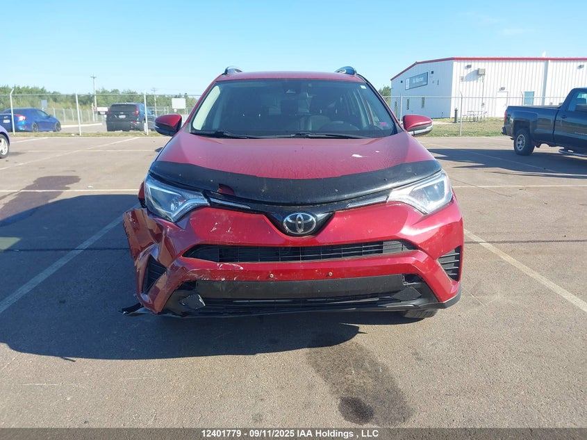 2018 Toyota Rav4 Le VIN: 2T3BFREV6JW814439 Lot: 12401779