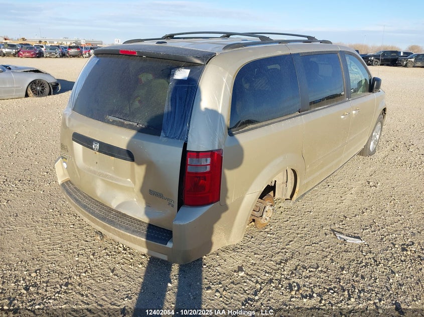 2D4RN4DEXAR325626 2010 DODGE CARAVAN photo no. 4