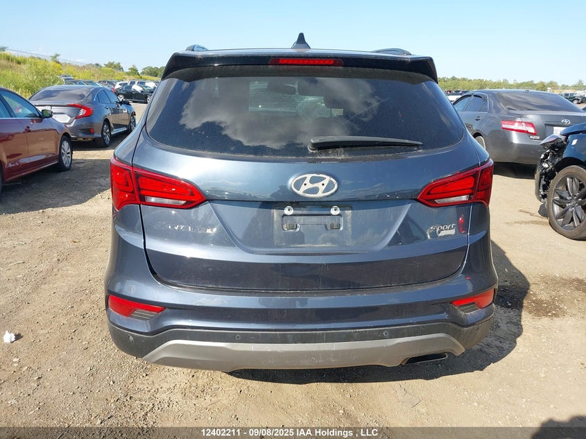 5NMZUDLB4JH055312 2018 HYUNDAI SANTA FE photo no. 17