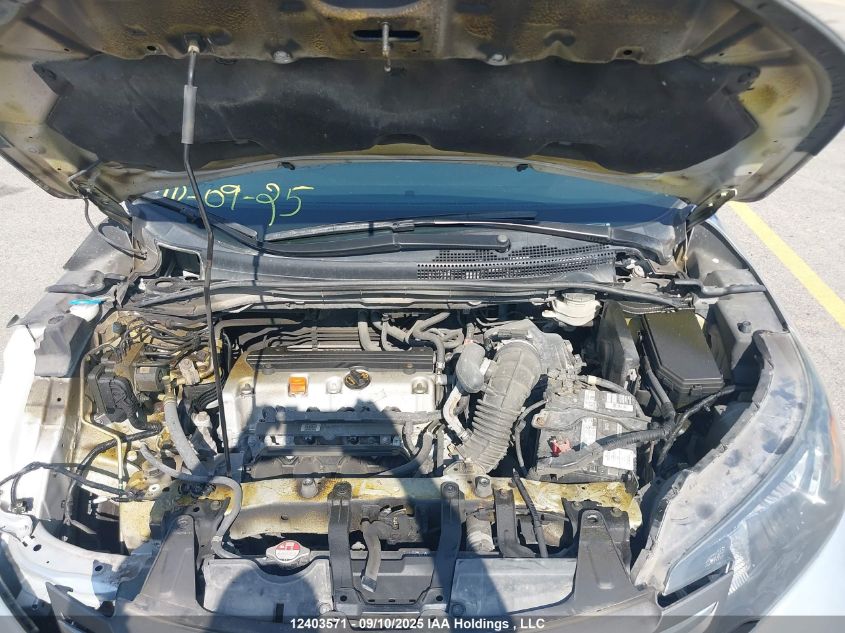 2014 Honda Cr-V VIN: 2HKRM3H55EH002401 Lot: 12403571