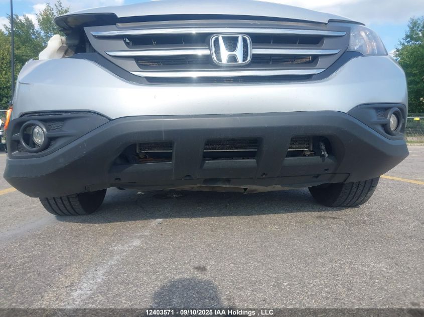 2014 Honda Cr-V VIN: 2HKRM3H55EH002401 Lot: 12403571