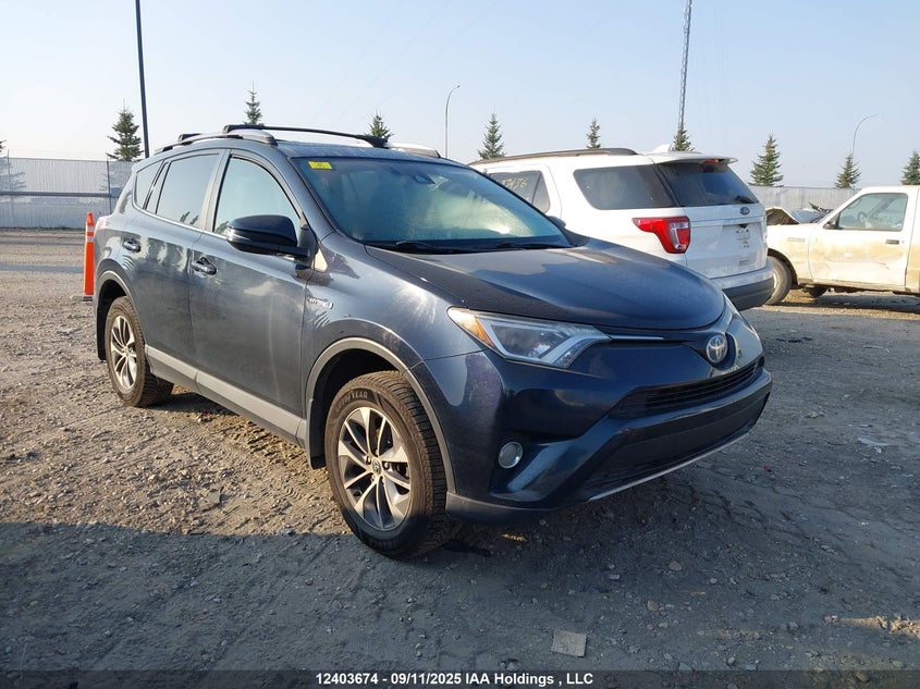JTMRJREVXJD160474 2018 Toyota Rav4 Hybrid Le+ auction photo 1