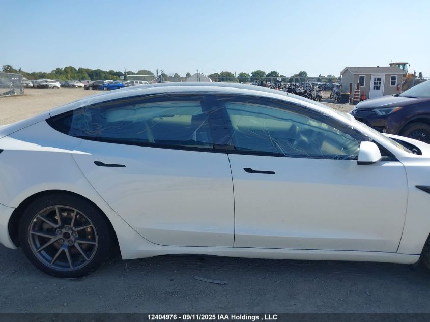 2023 Tesla Model 3 VIN: LRW3E1FA6PC875710 Lot: 12404976