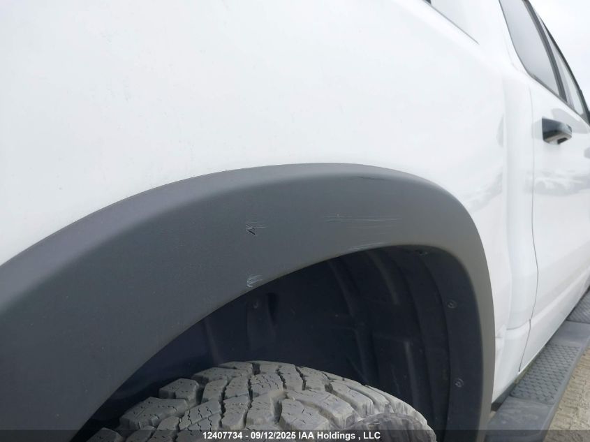 2023 Ram 1500 Rebel VIN: 1C6SRFLT6PN695676 Lot: 12407734