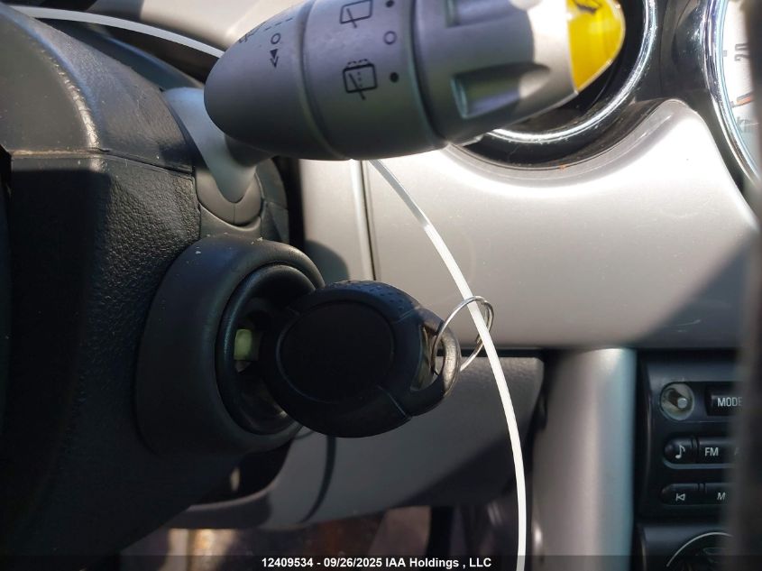 2006 Mini Cooper VIN: WMWRC33586TK18036 Lot: 12409534