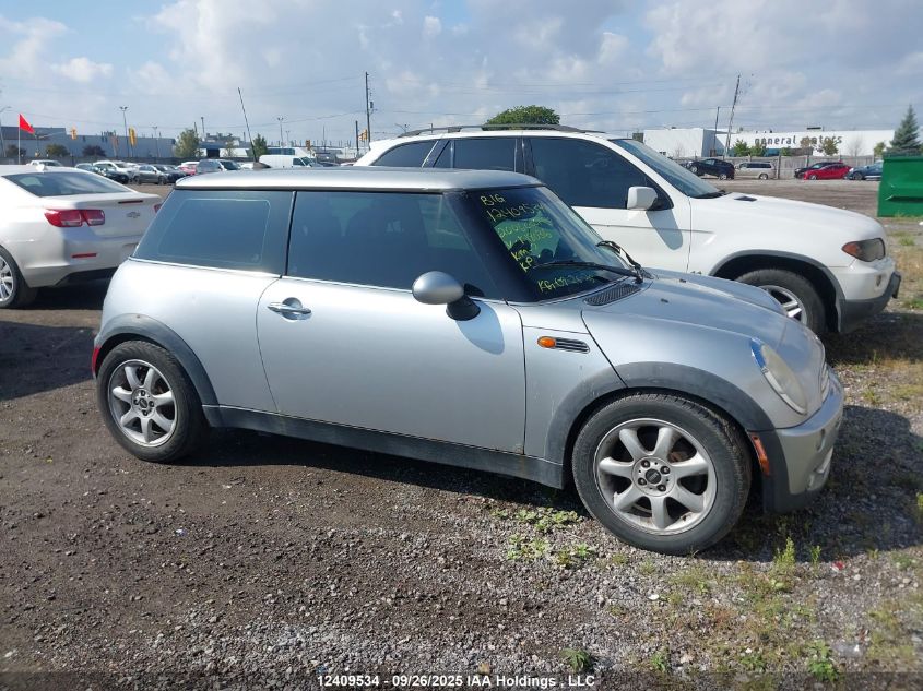 2006 Mini Cooper VIN: WMWRC33586TK18036 Lot: 12409534